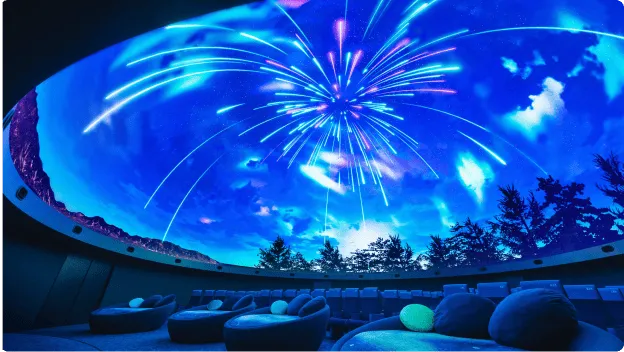 Dome theater with beautiful starry sky images on a hemispherical screen.