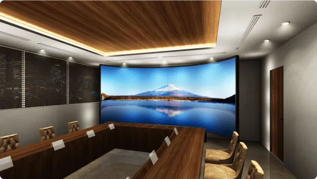 Curved LED vision installed on the full wall of the conference room.